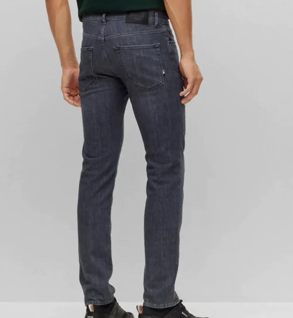 Sure, here is an optimized title for the e-commerce product:

Hugo Boss Maine3 Mens Slim-Fit Grey Jeans - Style 50488508